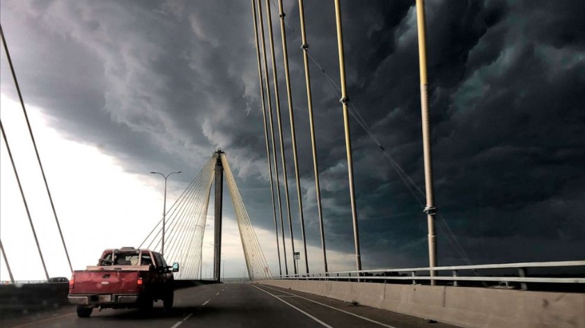 East Coast faces storms and heat wave